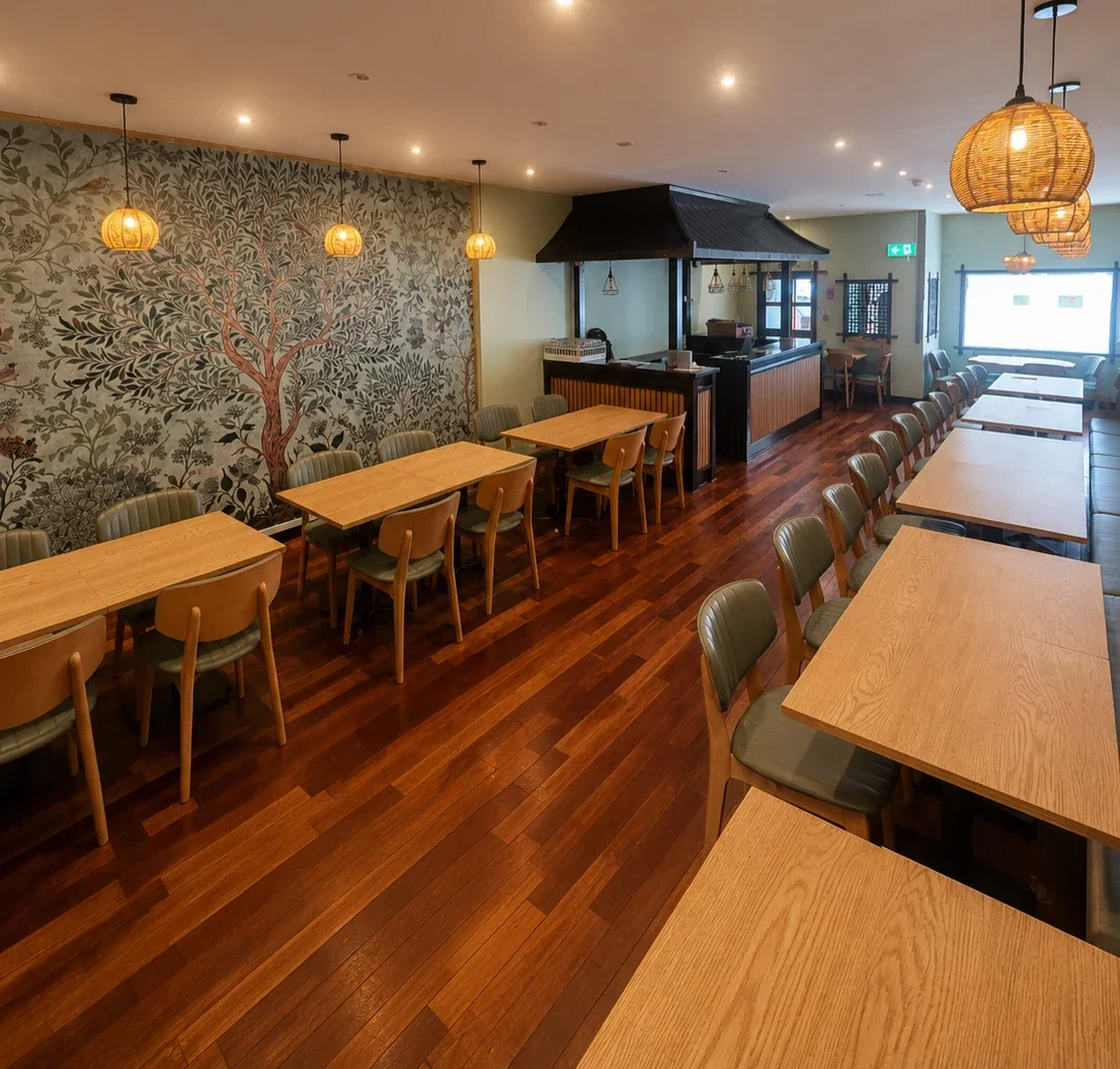 Sevana dining room with Tree of Life mural and warm lantern lights